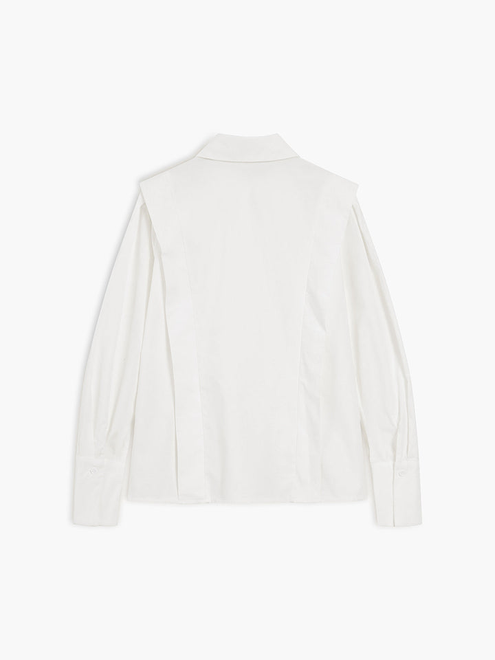 Women's white button-up shirt with wide cuffs and pointed collar, long sleeves