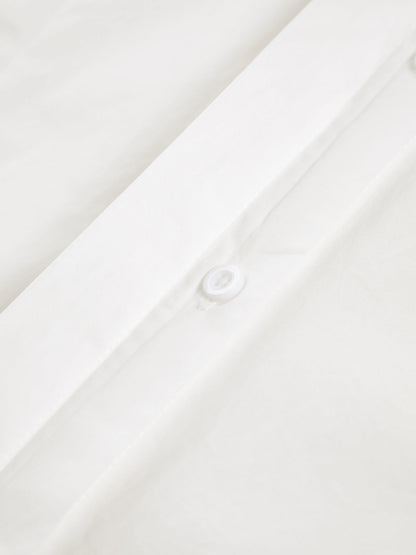 Women's white button-up shirt with wide cuffs and pointed collar, long sleeves