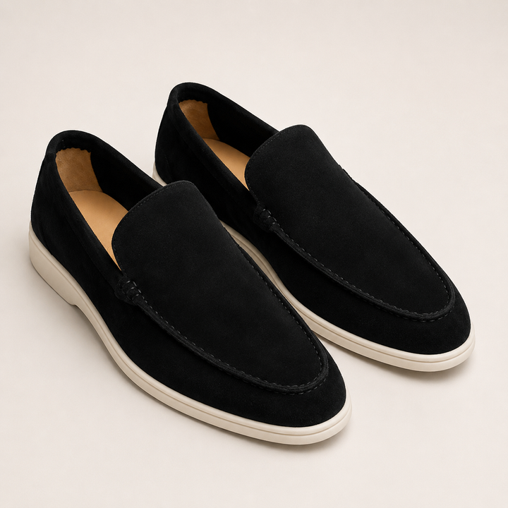 Men's slip-on loafers with rounded toes, stitched trim and flat soles