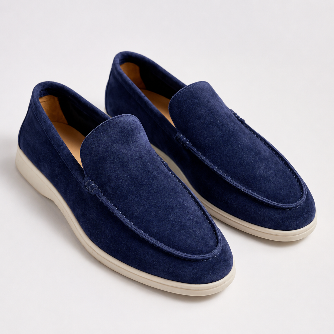 Men's slip-on loafers with rounded toes, stitched trim and flat soles
