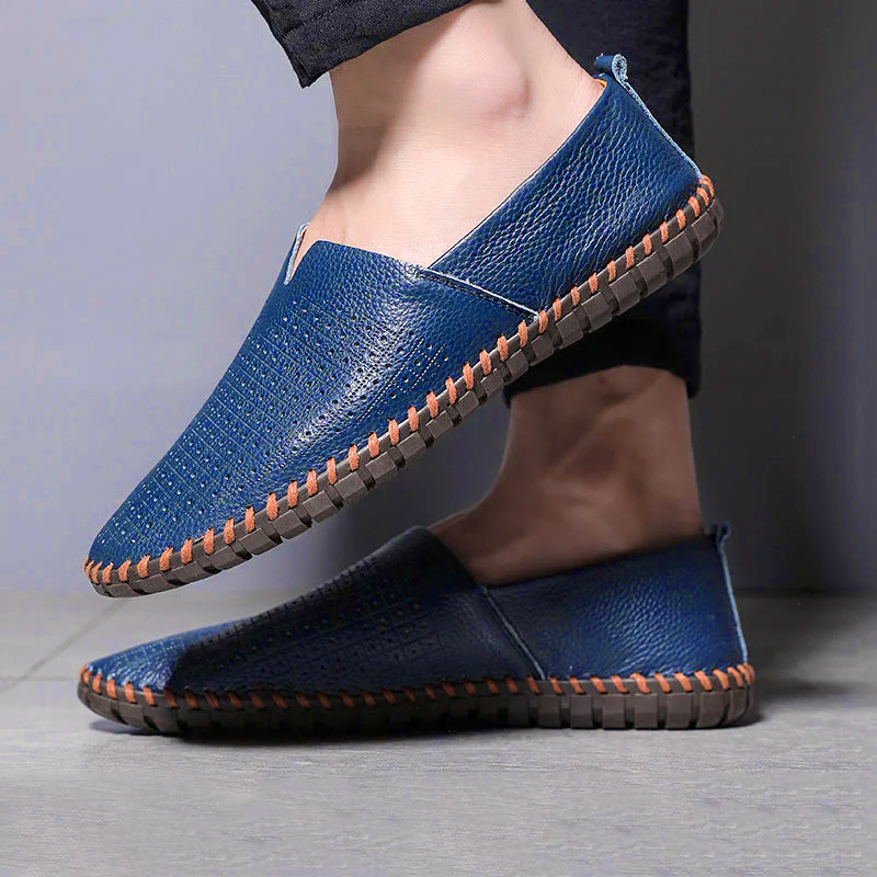 Men's textured slip-on loafer with round toe, flat sole and contrast stitched edge