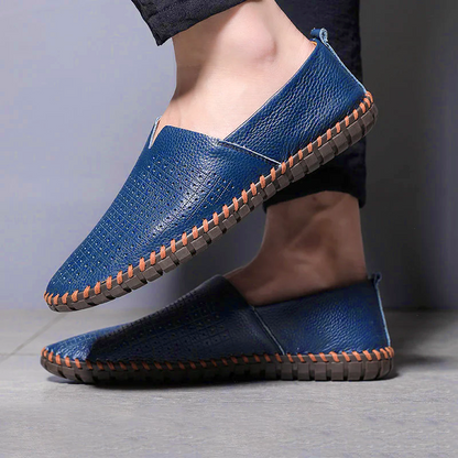 Men's textured slip-on loafer with round toe, flat sole and contrast stitched edge