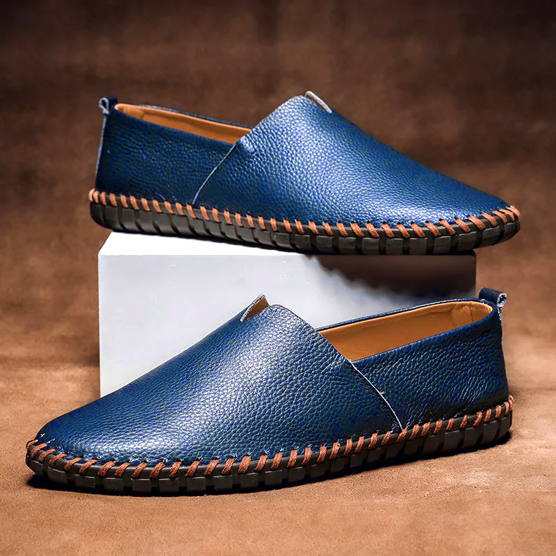 Men's textured slip-on loafer with round toe, flat sole and contrast stitched edge