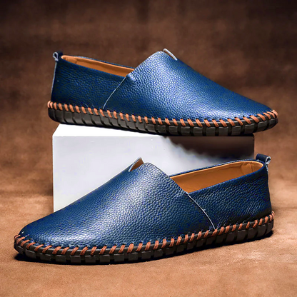 Men's textured slip-on loafer with round toe, flat sole and contrast stitched edge