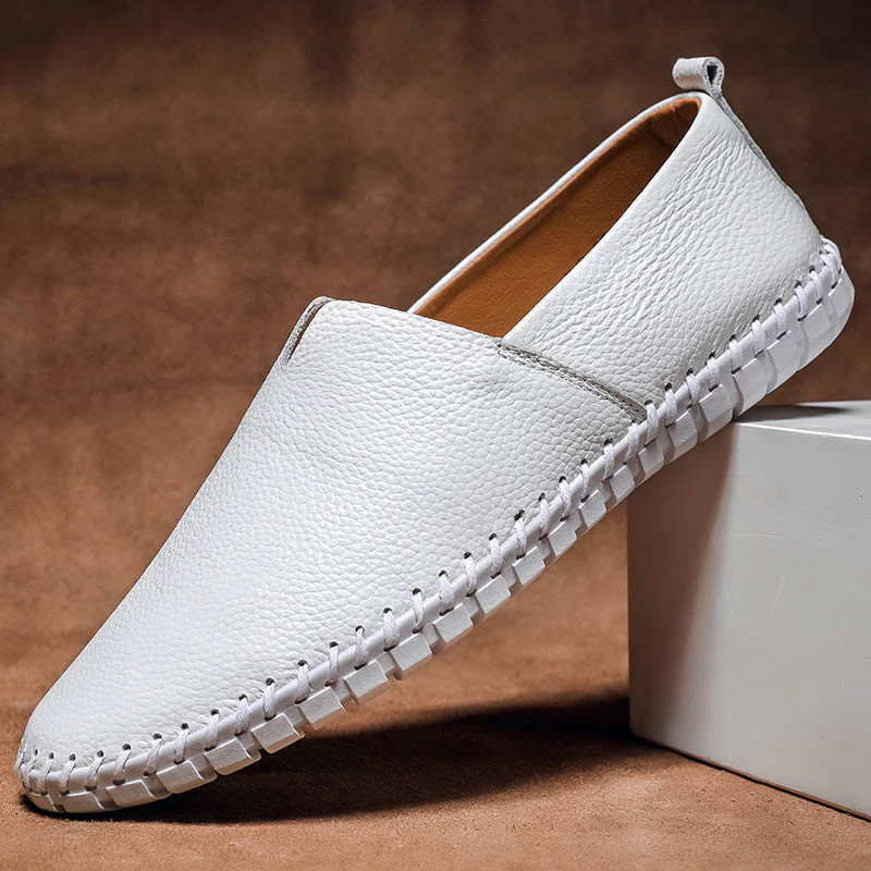 Men's textured slip-on loafer with round toe, flat sole and contrast stitched edge