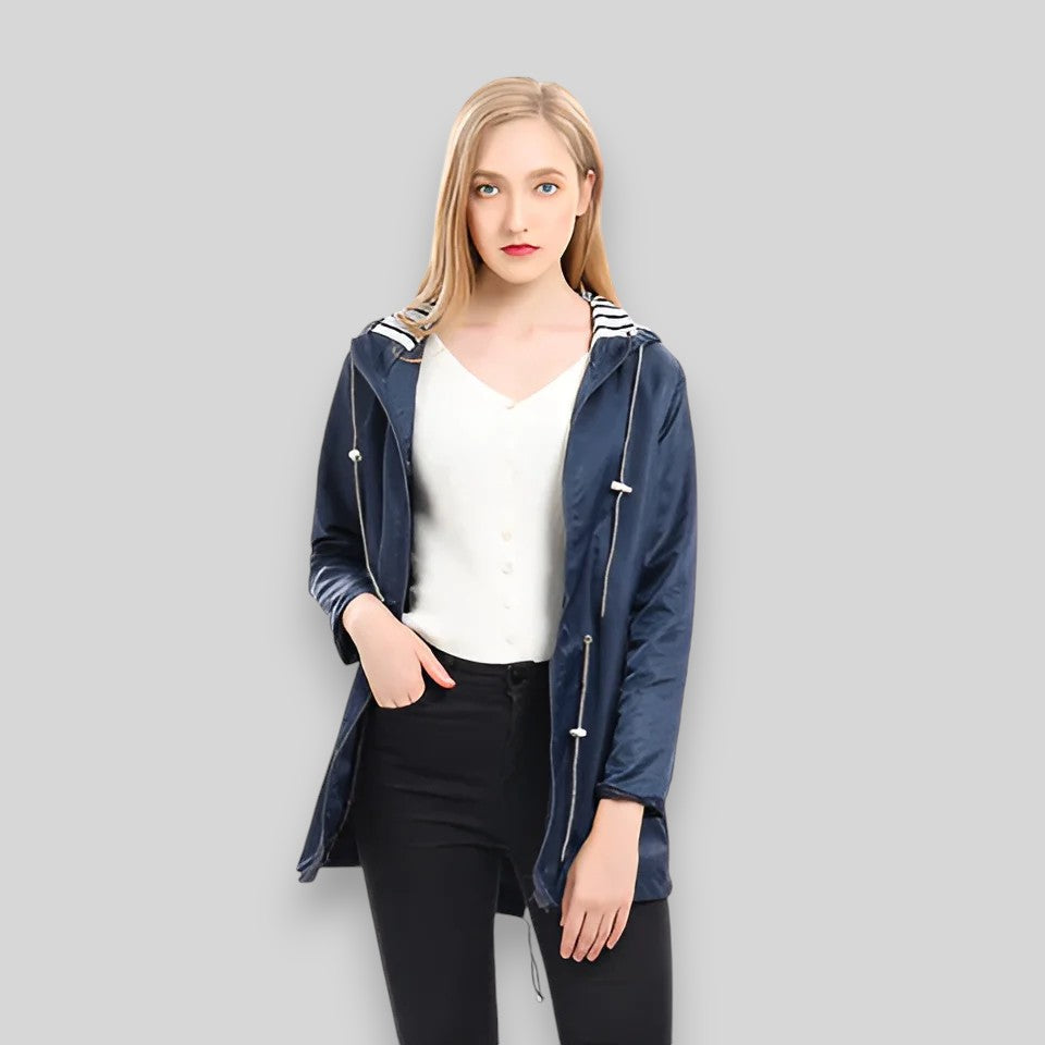 Women's hooded rain jacket with long sleeves, zip front and striped lining