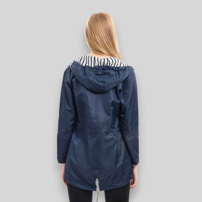 Women's hooded rain jacket with long sleeves, zip front and striped lining