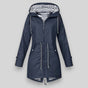 Women's hooded rain jacket with long sleeves, zip front and striped lining