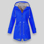 Women's hooded rain jacket with long sleeves, zip front and striped lining
