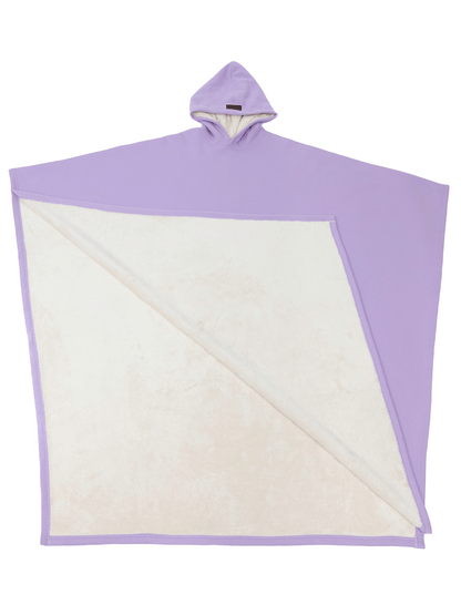 Oversized hooded poncho with plush-looking lining and wide sleeves
