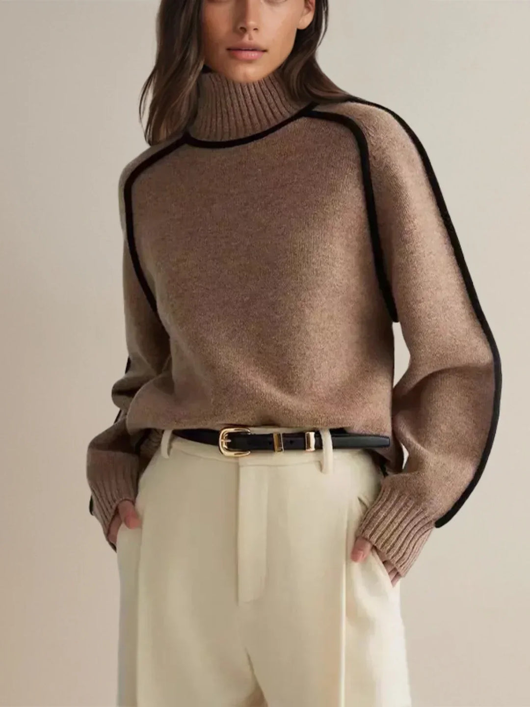 Women's oversized turtleneck sweater with contrast piping and long sleeves