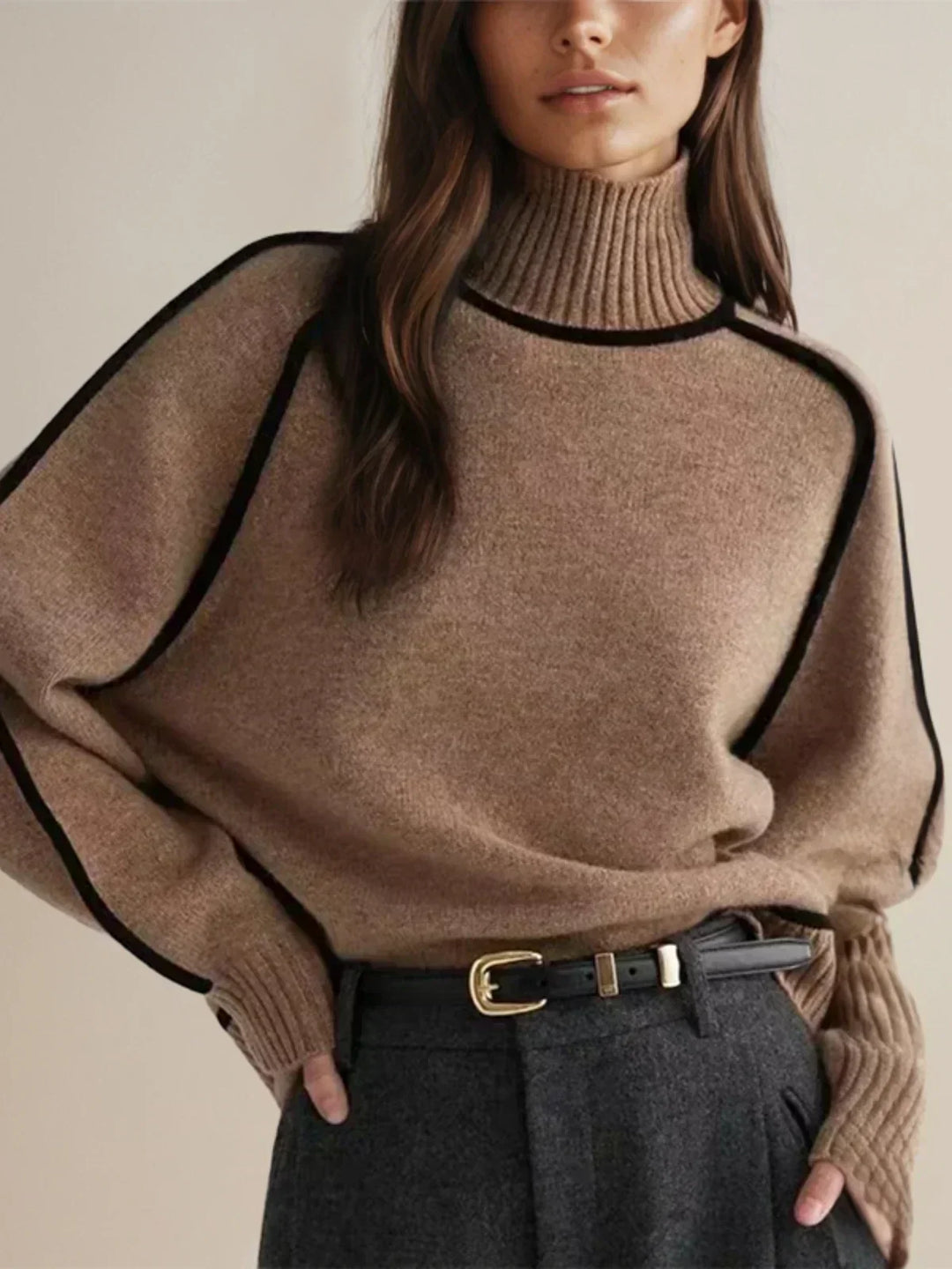 Women's oversized turtleneck sweater with contrast piping and long sleeves