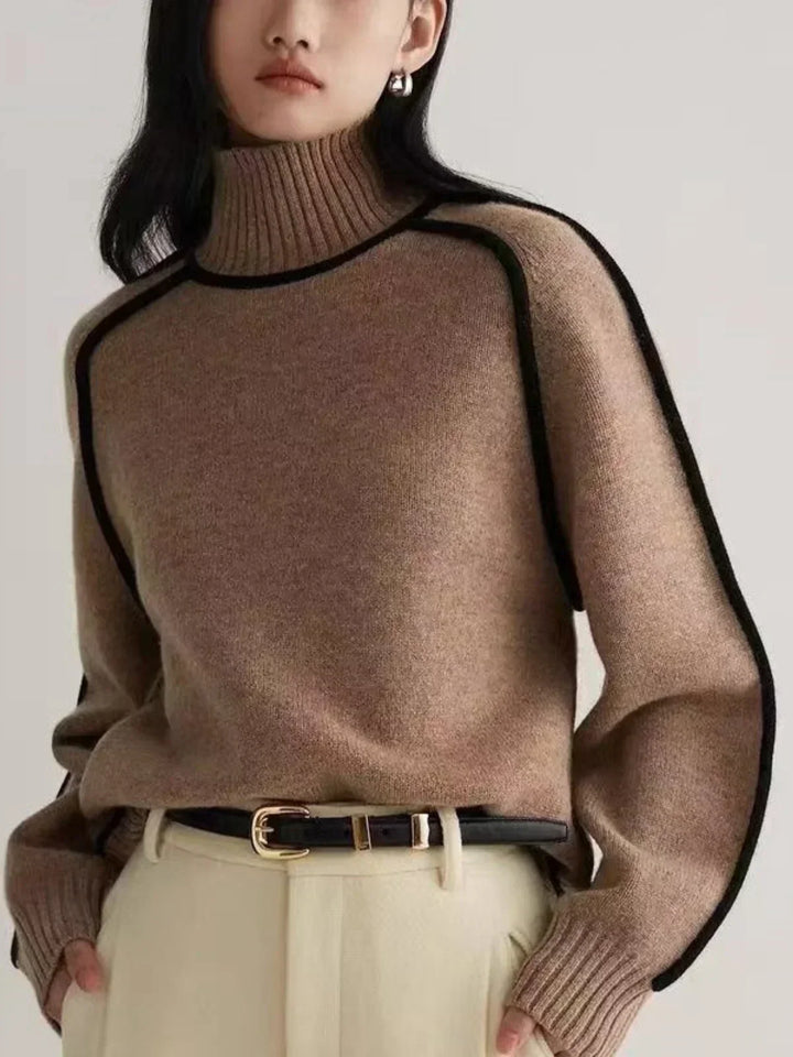 Women's oversized turtleneck sweater with contrast piping and long sleeves