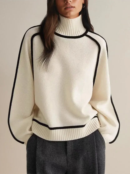 Women's oversized turtleneck sweater with contrast piping and long sleeves
