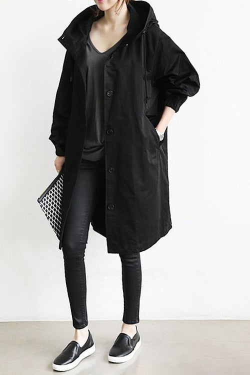 Women's hooded longline trench coat with button front, elastic cuffs and side pockets