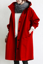 Women's hooded longline trench coat with button front, elastic cuffs and side pockets