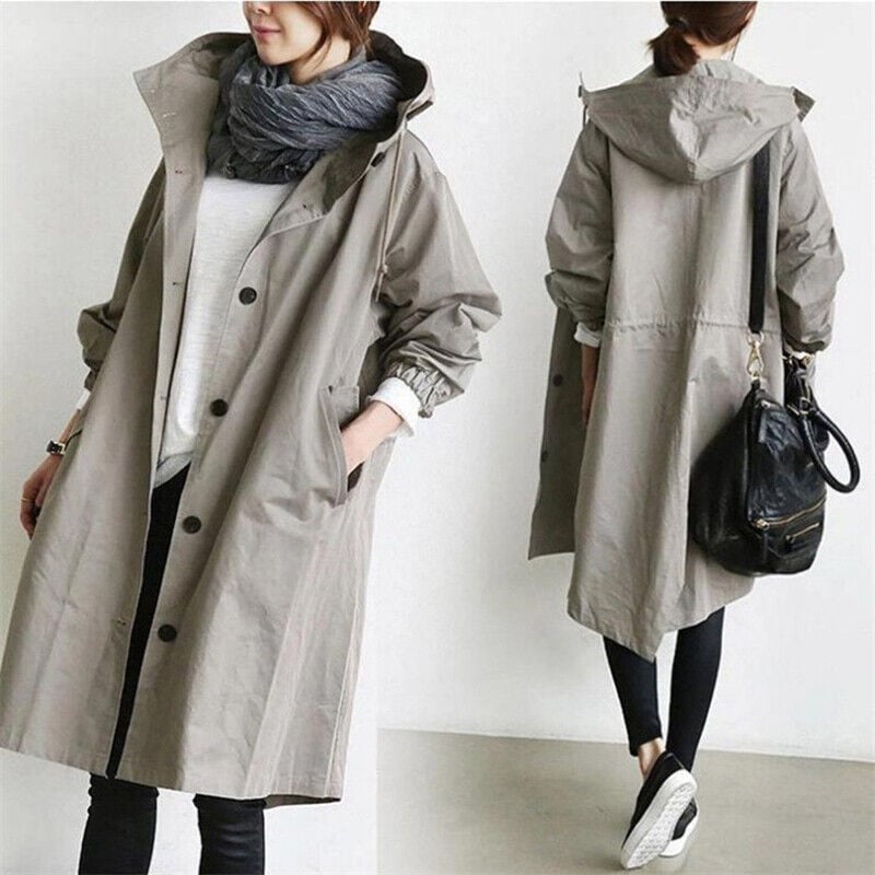 Women's hooded longline trench coat with button front, elastic cuffs and side pockets