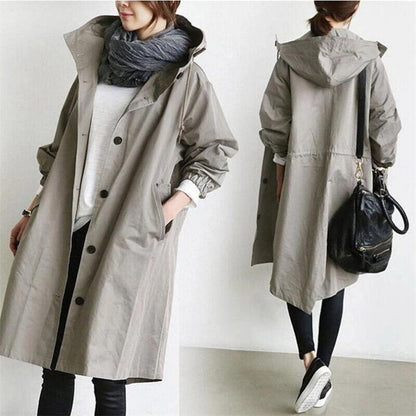 Women's hooded longline trench coat with button front, elastic cuffs and side pockets