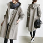 Women's hooded longline trench coat with button front, elastic cuffs and side pockets