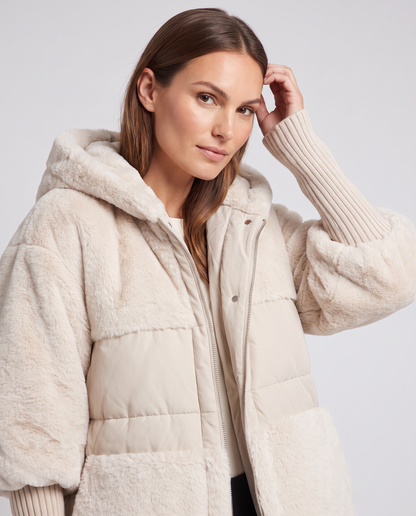 Women's hooded textured panel jacket with quilted sections and ribbed cuffs