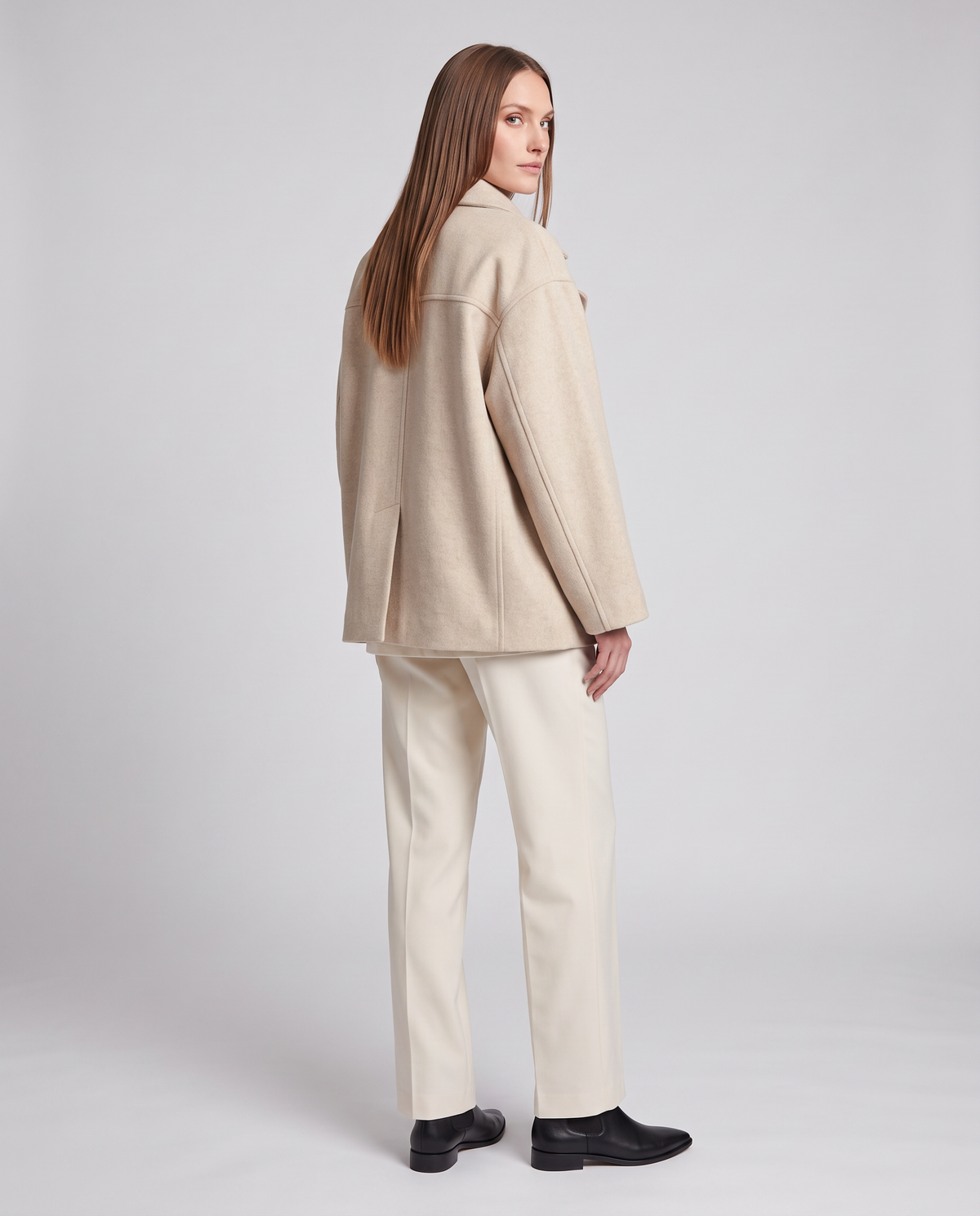 Women's short button-front coat with high collar and long sleeves