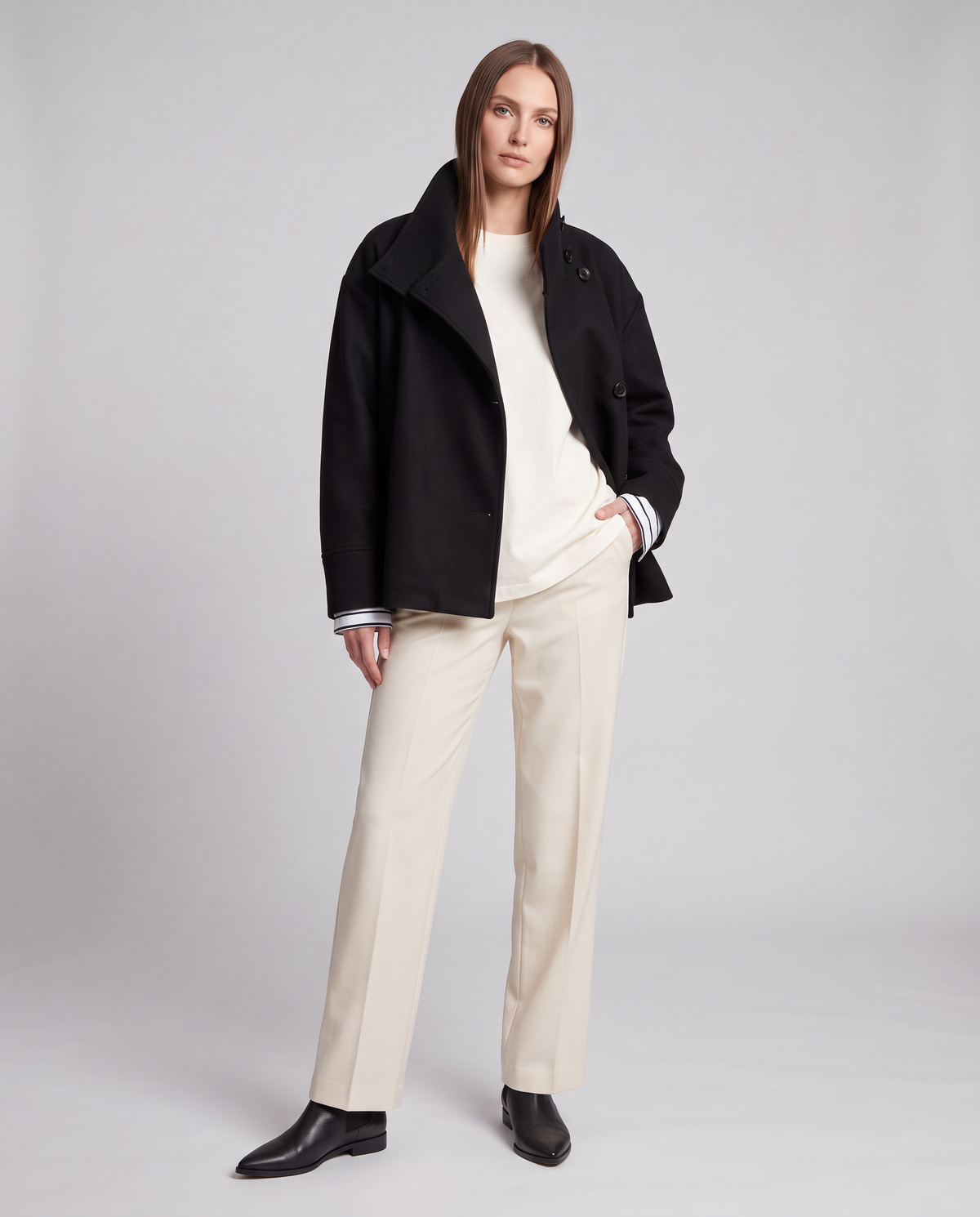 Women's short button-front coat with high collar and long sleeves