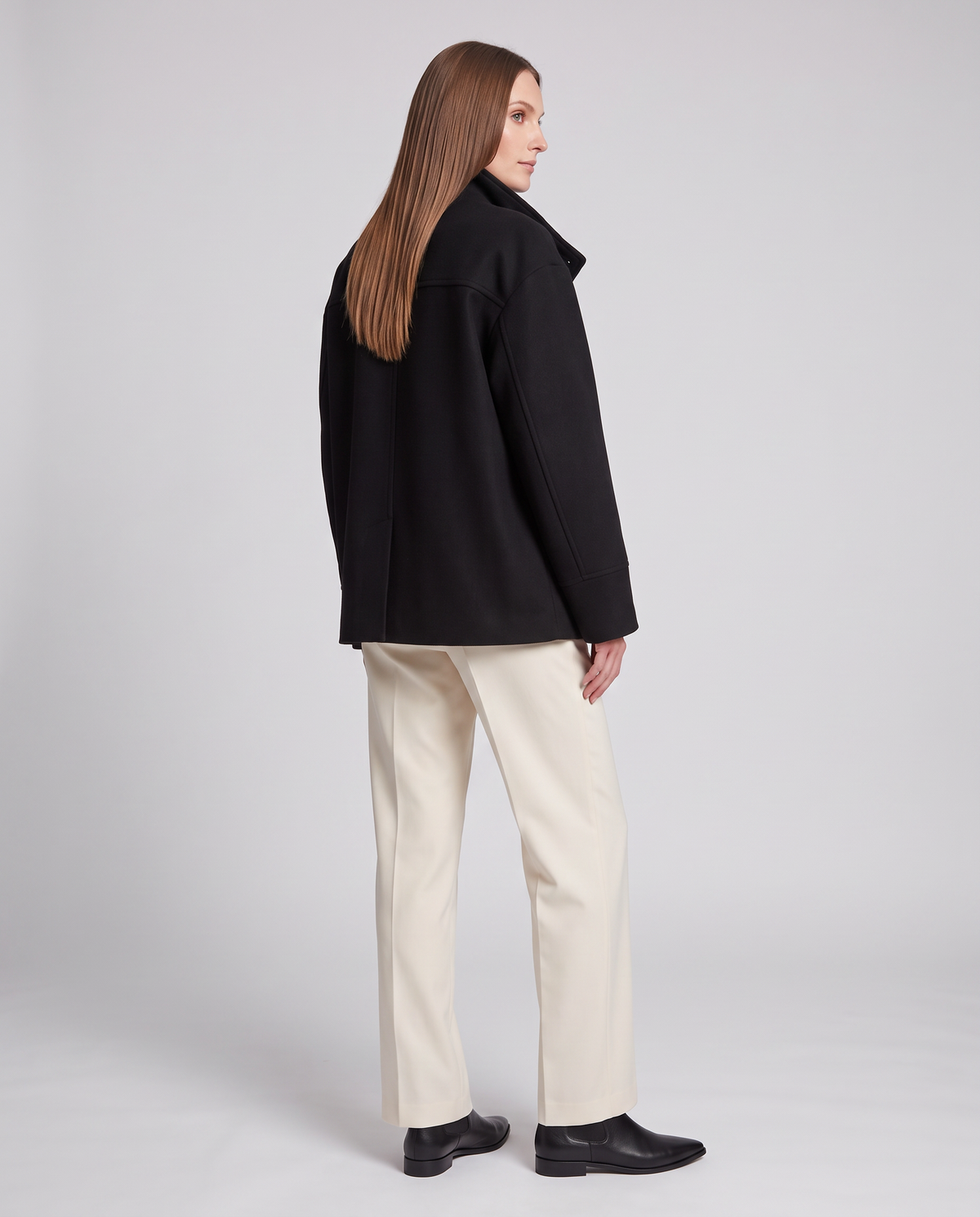 Women's short button-front coat with high collar and long sleeves