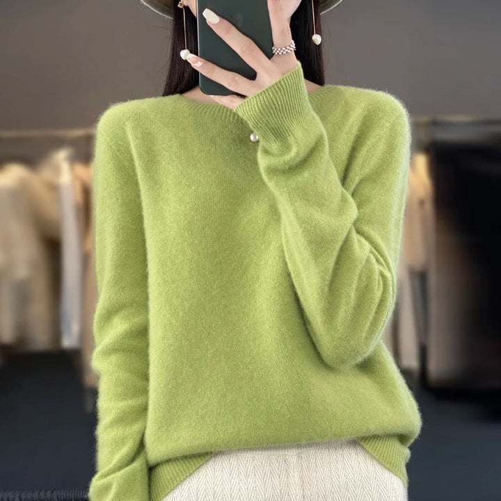 Women's crew neck knitted sweater with long sleeves and ribbed trims