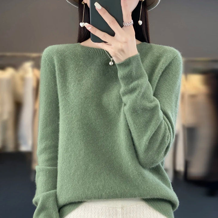 Women's crew neck knitted sweater with long sleeves and ribbed trims