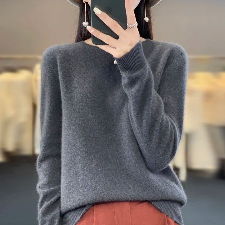 Women's crew neck knitted sweater with long sleeves and ribbed trims