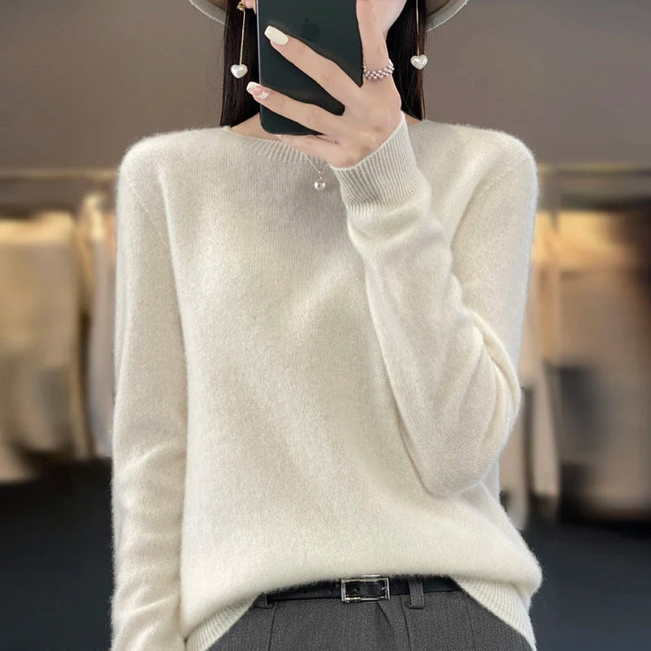 Women's crew neck knitted sweater with long sleeves and ribbed trims
