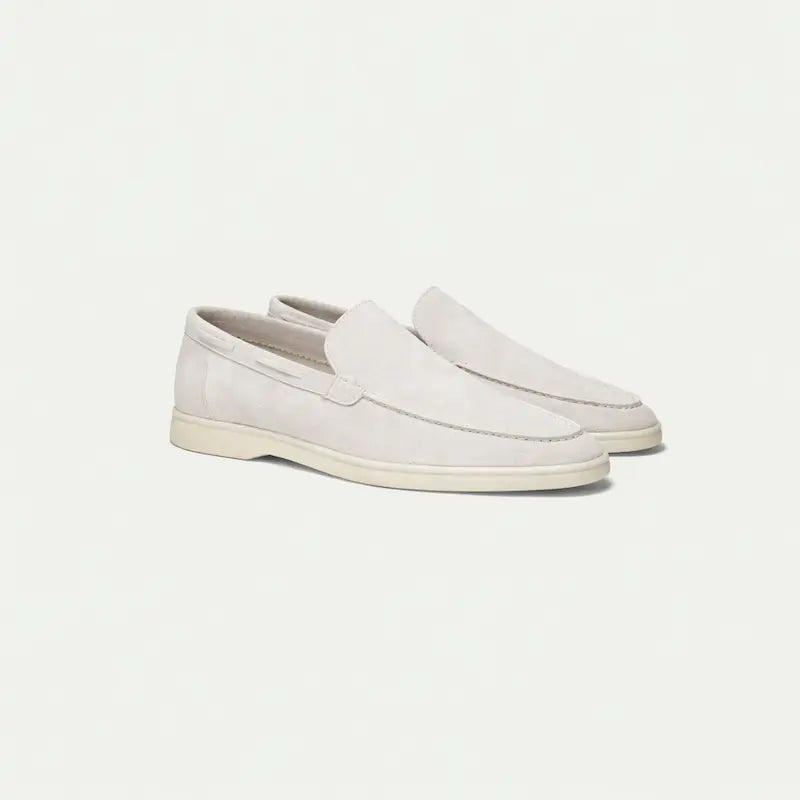 Men's off-white slip-on loafers with rounded toes and flat soles