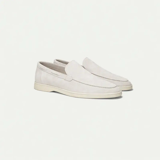 Men's off-white slip-on loafers with rounded toes and flat soles