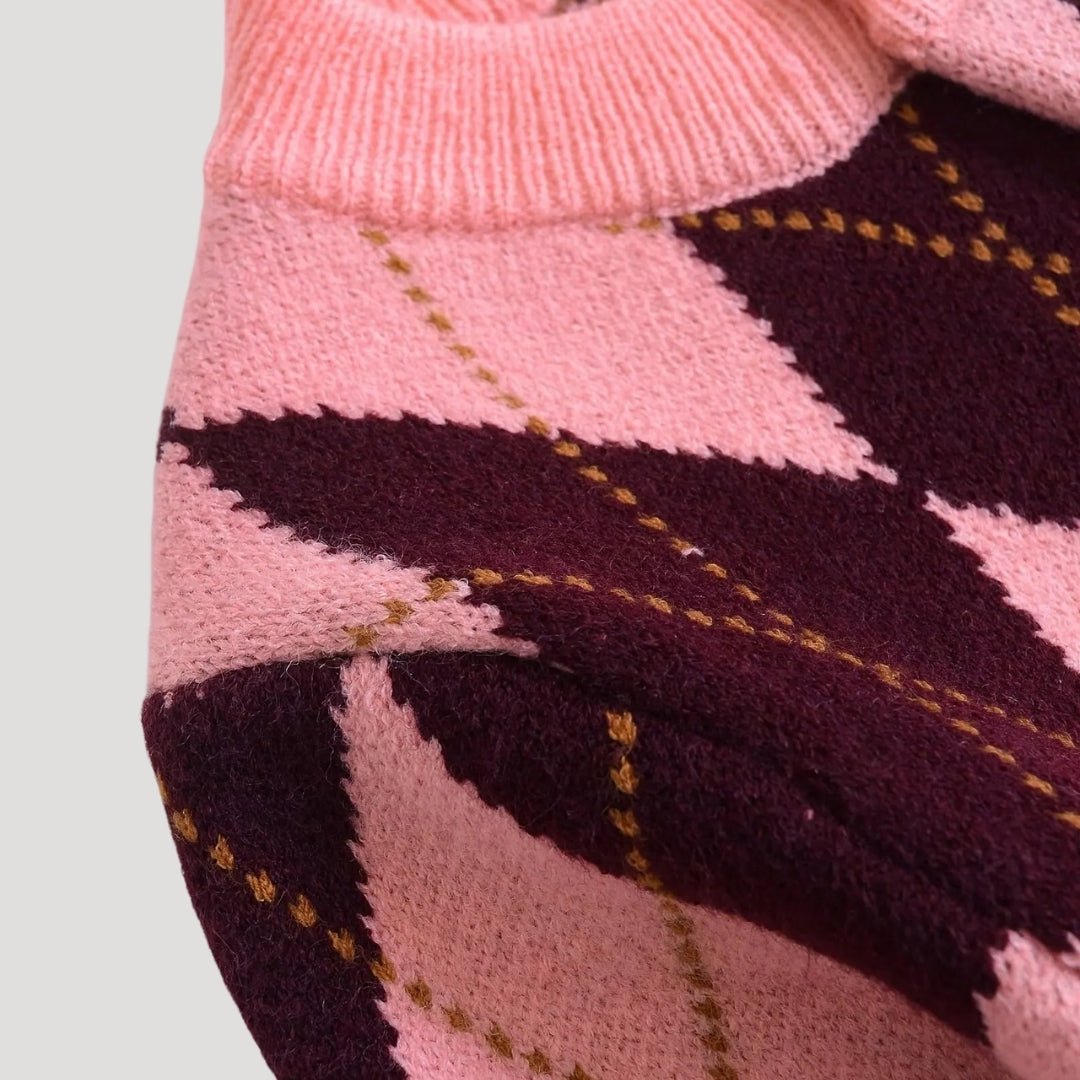 Women's pink and burgundy argyle cropped cardigan with buttons and long sleeves