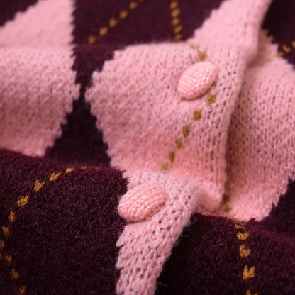 Women's pink and burgundy argyle cropped cardigan with buttons and long sleeves