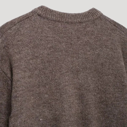 Women's cropped knit cardigan with crew neck and button front