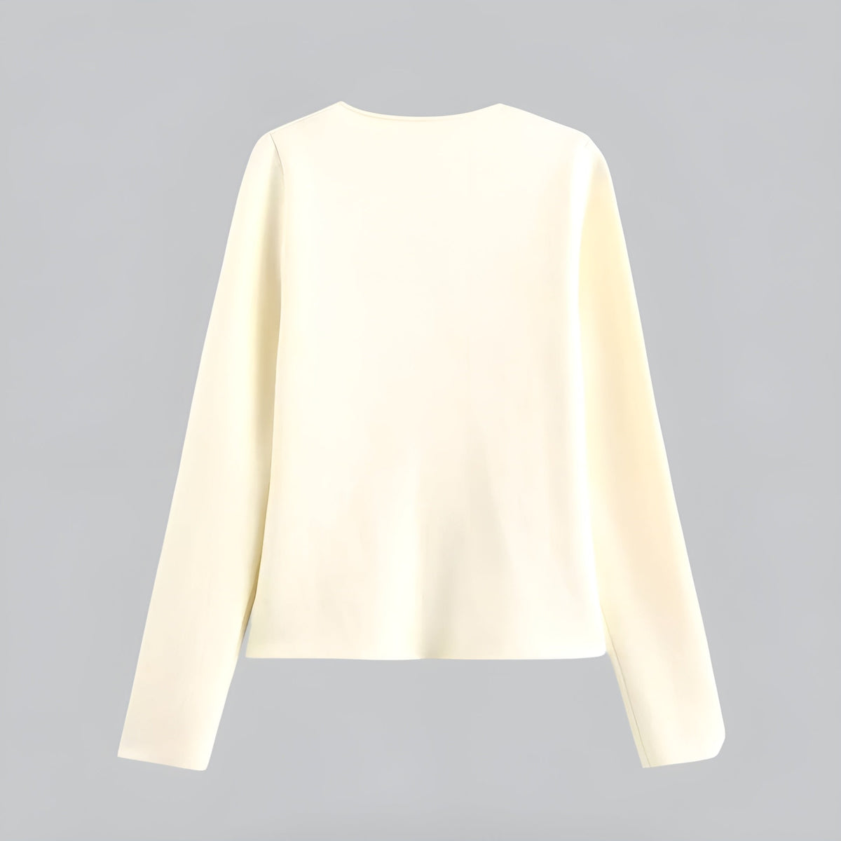 Women's V-neck button front knit cardigan with long sleeves and short hem