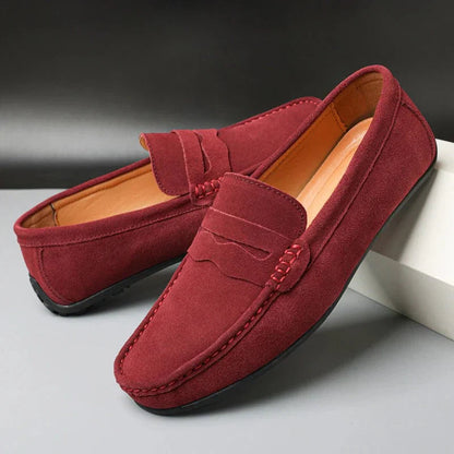 Men's slip-on loafers with moc toe and penny strap detail