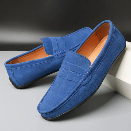 Men's slip-on loafers with moc toe and penny strap detail