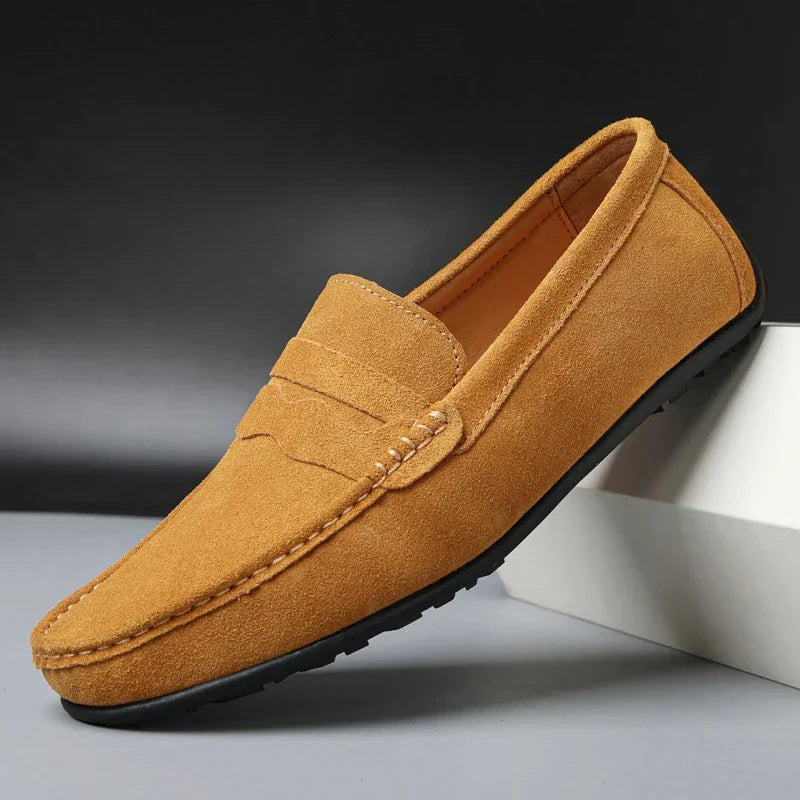 Men's slip-on loafers with moc toe and penny strap detail