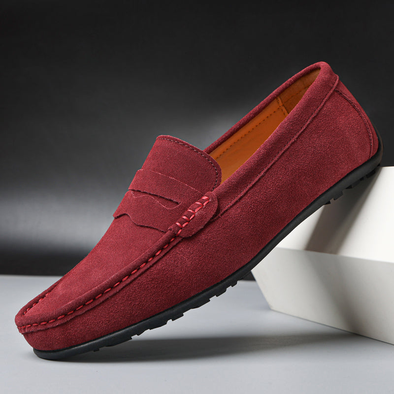 Men's slip-on loafers with moc toe and penny strap detail