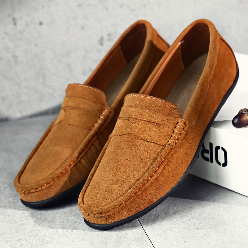 Men's slip-on loafers with moc toe and penny strap detail
