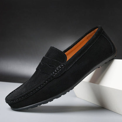 Men's slip-on loafers with moc toe and penny strap detail