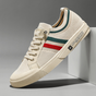 Men's lace-up sneakers with contrasting striped sides and flat soles