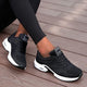 Women's lace-up sneakers with perforated panels and air cushion sole