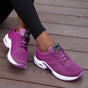 Women's lace-up sneakers with perforated panels and air cushion sole