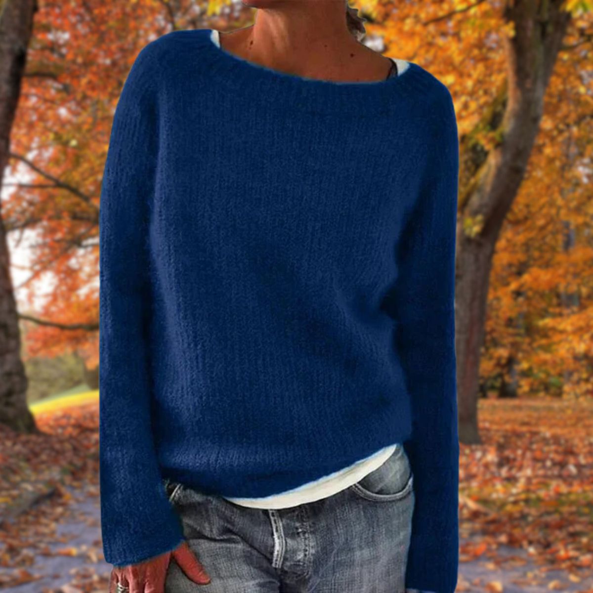 Women's long-sleeve ribbed crew neck sweater with relaxed hip-length fit