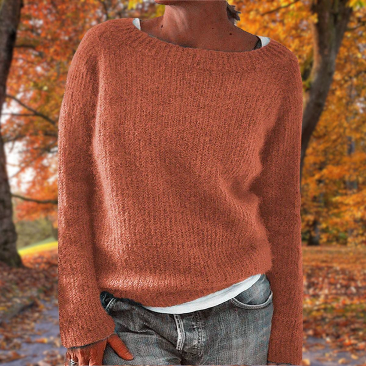 Women's long-sleeve ribbed crew neck sweater with relaxed hip-length fit