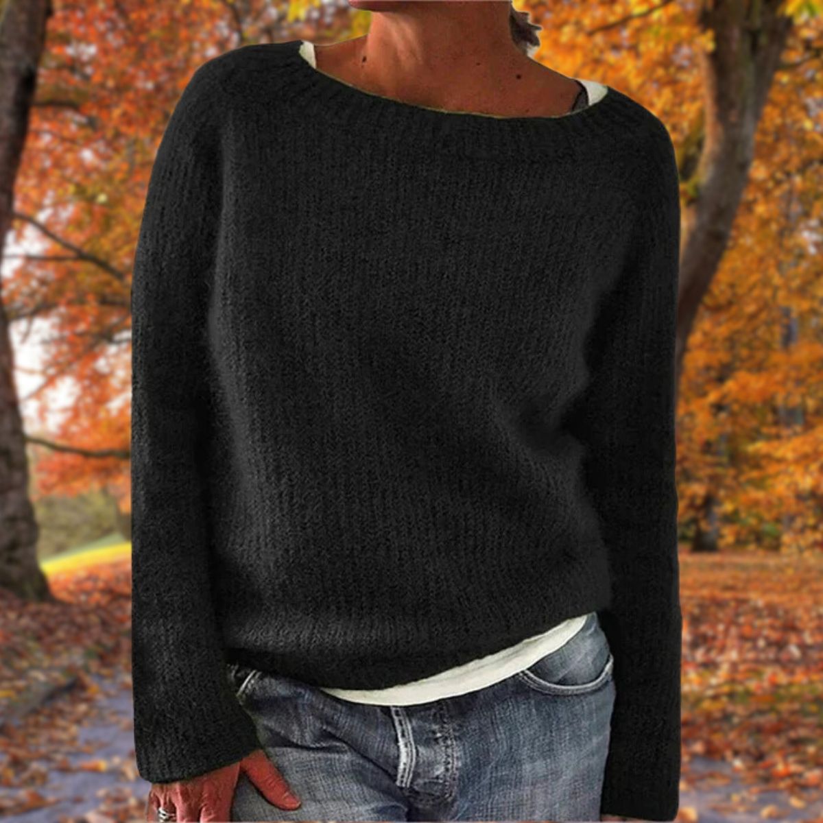 Women's long-sleeve ribbed crew neck sweater with relaxed hip-length fit