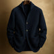 Women's ribbed knit cardigan with shawl collar and patch pockets